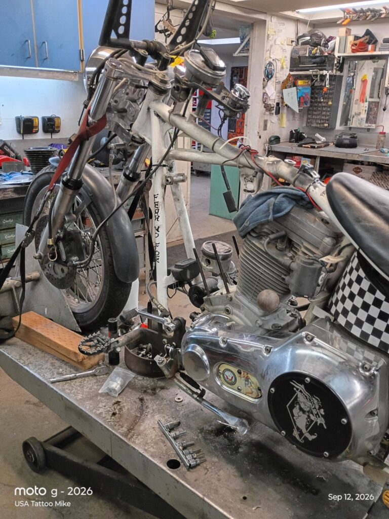 Harley Evolution motor torn down on the lift for a head gasket repair